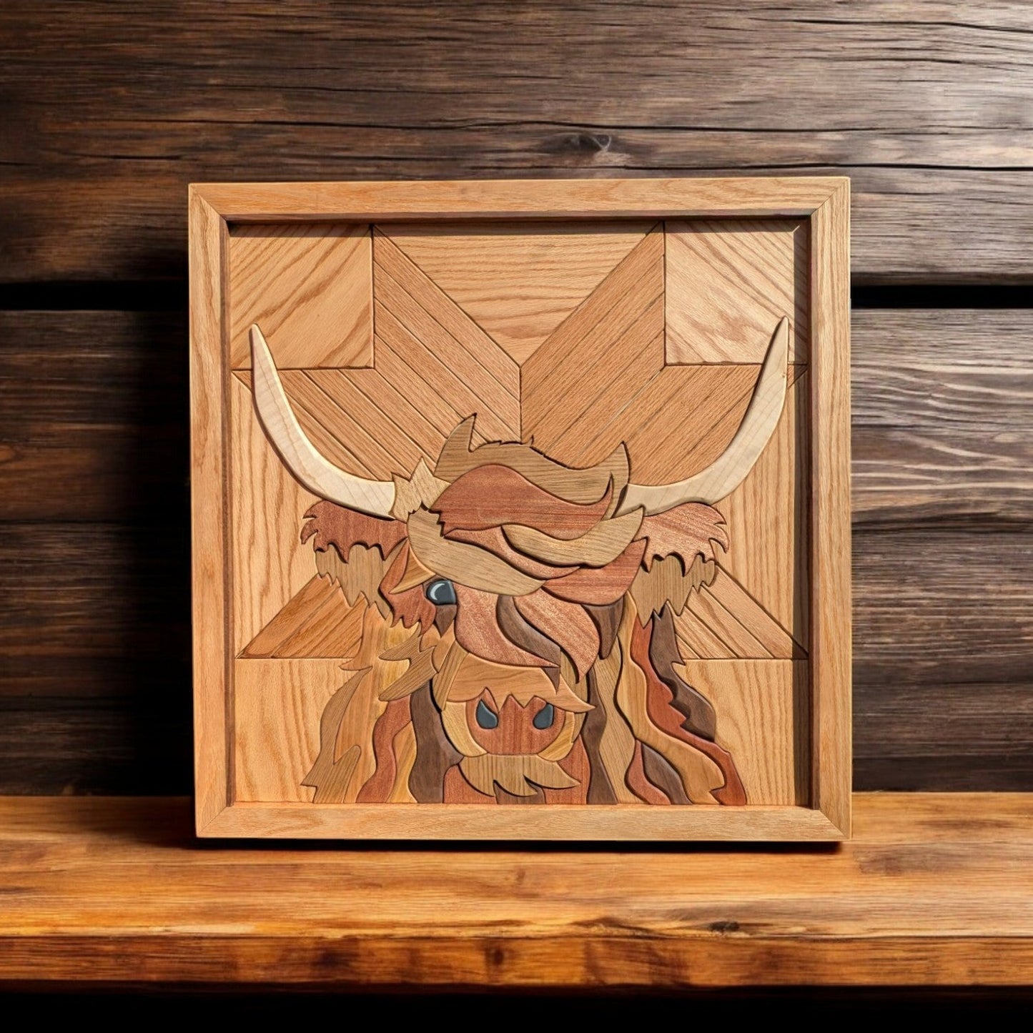 Photo of a highland cow wood mosaic wall art piece